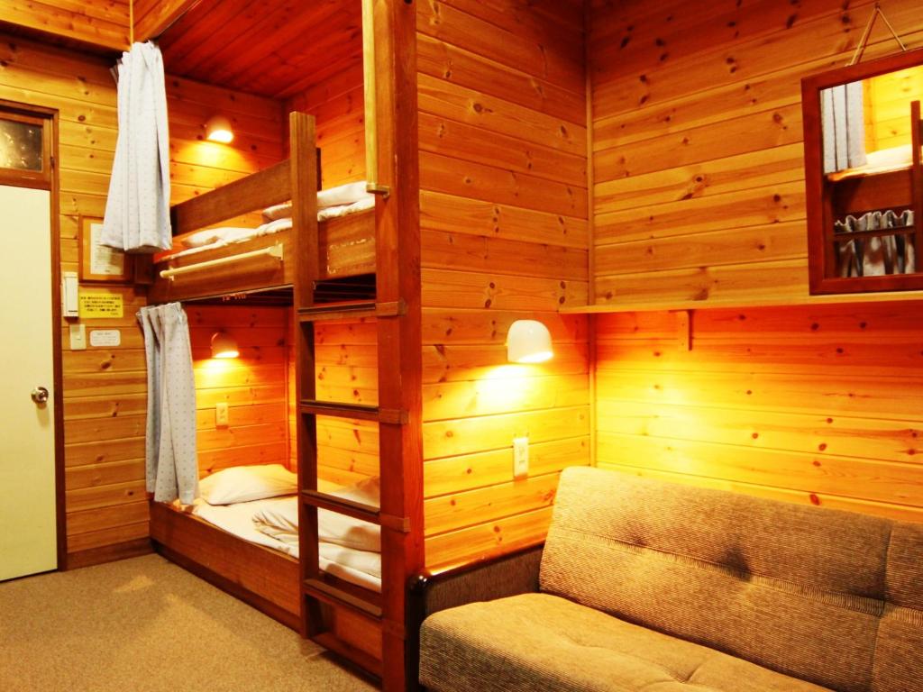 Postel nebo postele na pokoji v ubytování Ullr