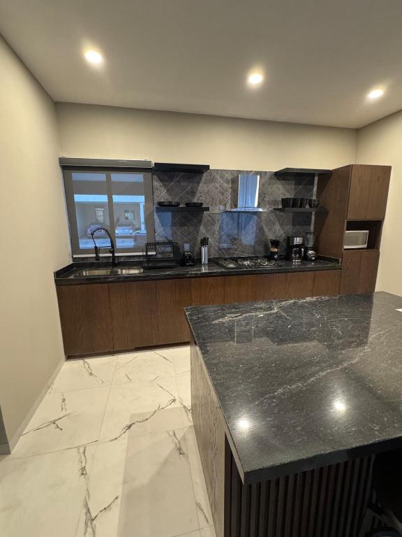 Kuchyň nebo kuchyňský kout v ubytování Casa Barcelona