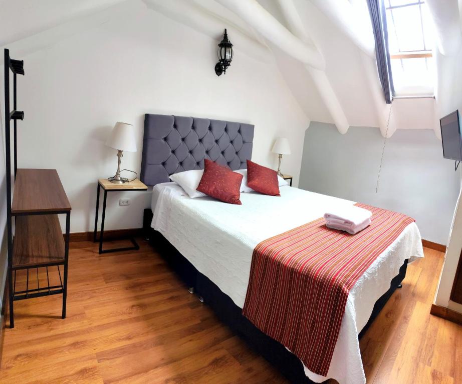 Postel nebo postele na pokoji v ubytování Kori Gems Inn