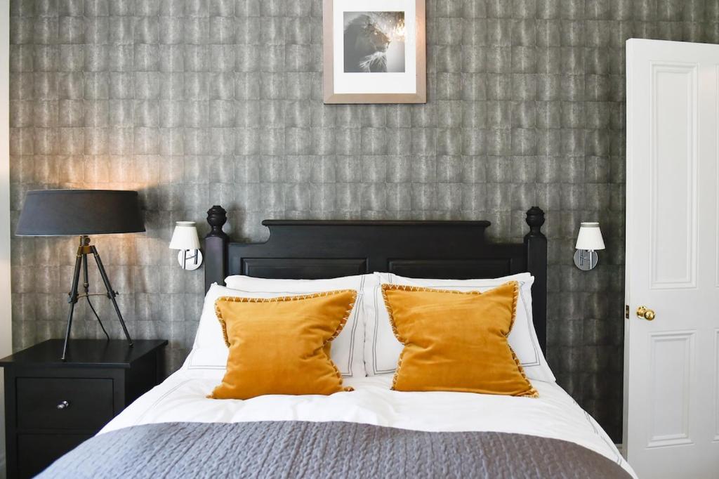 En eller flere senge i et værelse på White Fox House