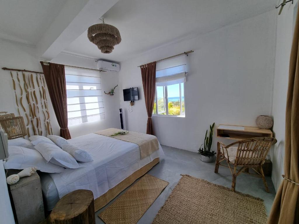 Ένα ή περισσότερα κρεβάτια σε δωμάτιο στο Kazalea