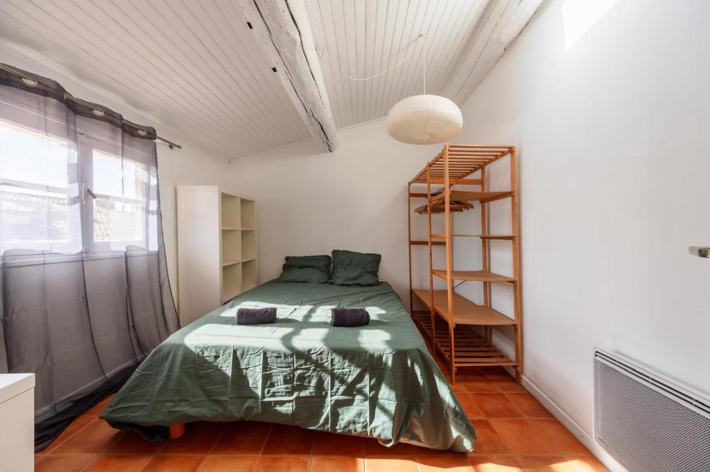 Postel nebo postele na pokoji v ubytování Les Toits d'Aix - Hyper center - Cours Mirabeau - Lumineux