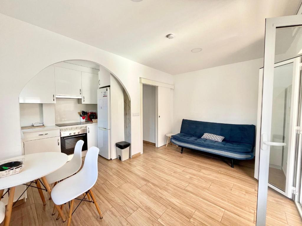 En eller flere senge i et værelse på Apartamento Caravaca