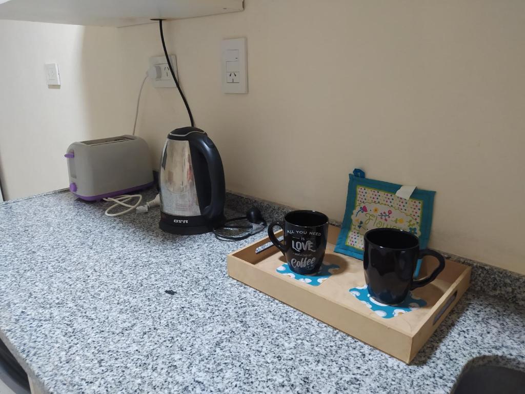 Příslušenství pro přípravu čaje a kávy v ubytování Amanecer Correntino