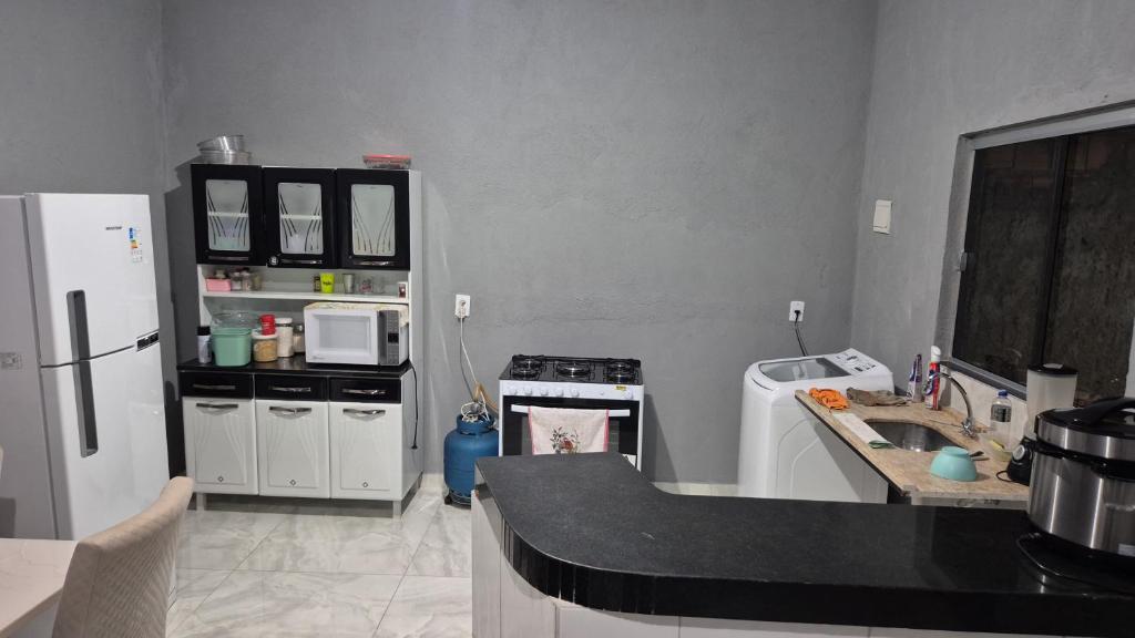 Kuchyň nebo kuchyňský kout v ubytování Wilson locações