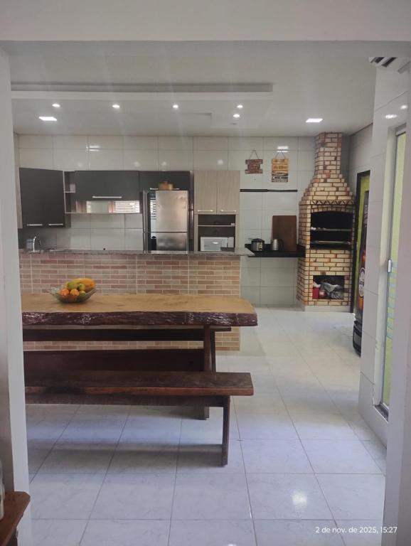 Køkken eller tekøkken på casa climatizada lateral da br