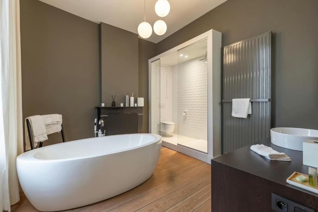 Et badeværelse på DeuxHommes B&B Massage & Spa