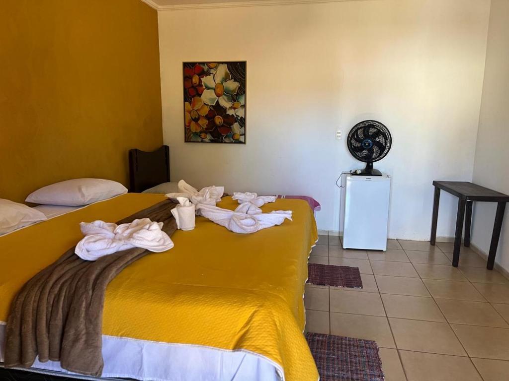 Postel nebo postele na pokoji v ubytování Pousada Recanto Guará