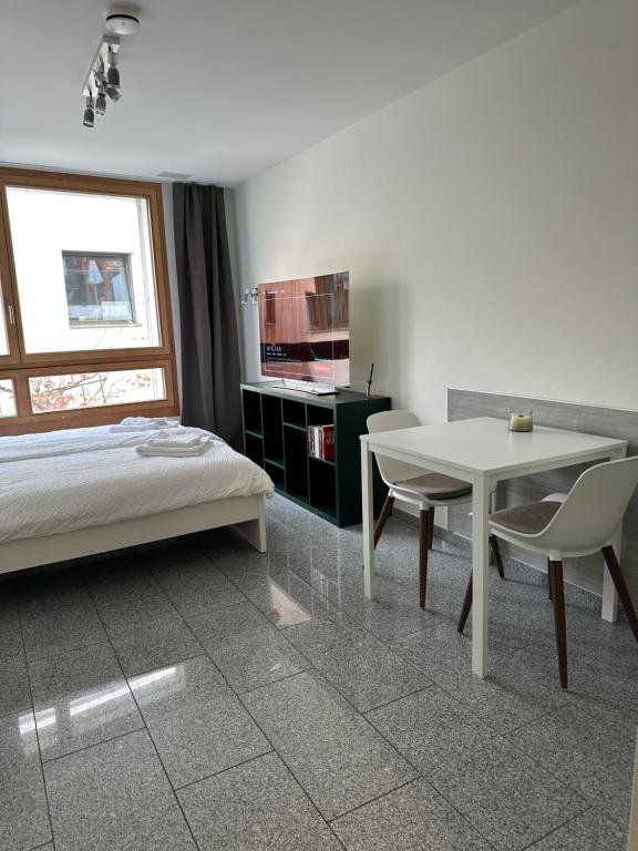 Ένα ή περισσότερα κρεβάτια σε δωμάτιο στο Bergstudio II I Flims I Laax I Ski I Caumasee