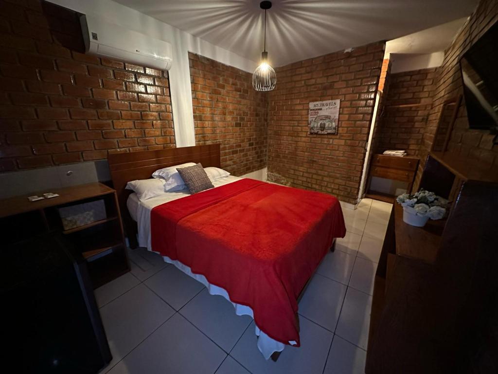 Postel nebo postele na pokoji v ubytování La Fogata del Sur