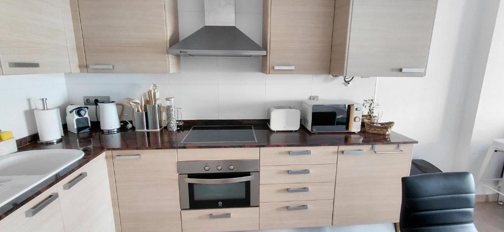 Kuchyň nebo kuchyňský kout v ubytování Els Dolors Sunny Flat - Mediterránea Sunny Keys