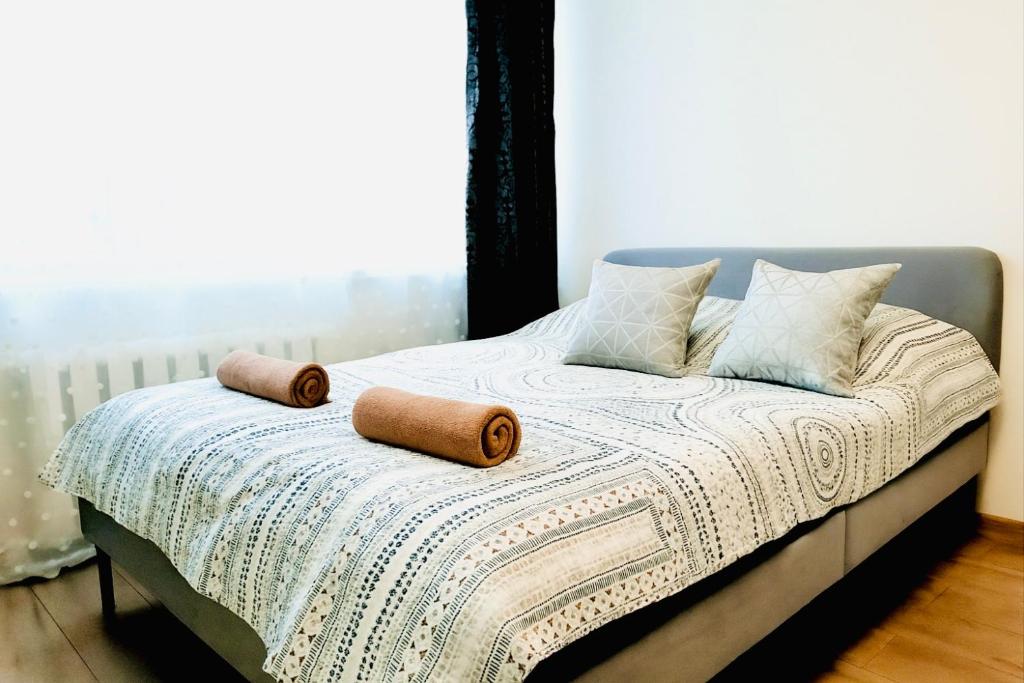 Postel nebo postele na pokoji v ubytování M&M Apartment VII Self CHECK-IN