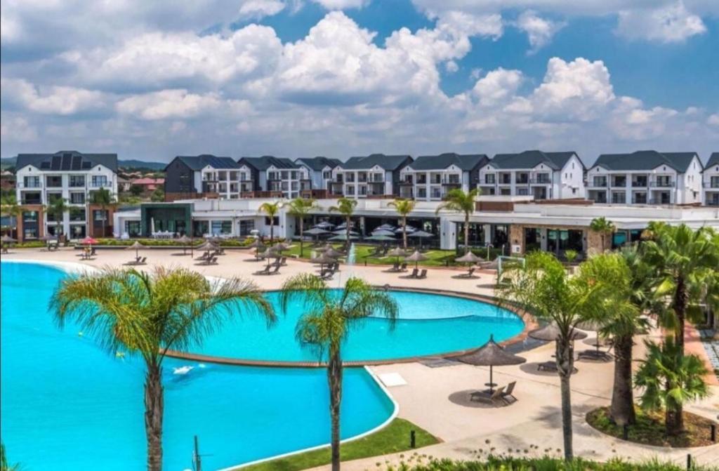 an image of the pool at the resort at Apartment at the Blyde in Pretoria