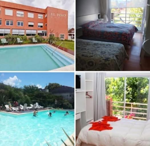 En eller flere senge i et værelse på Pino Hotel