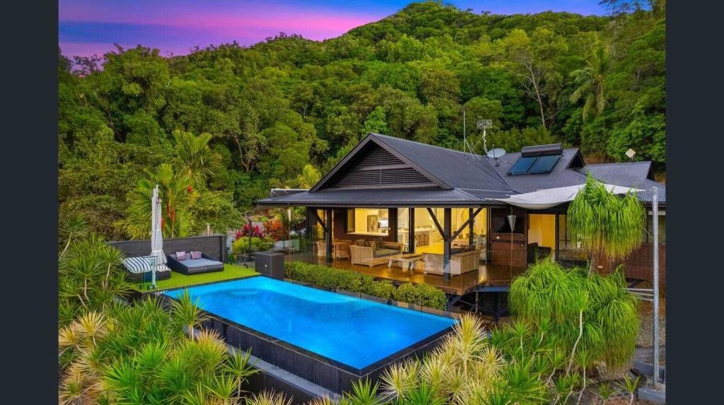 an aerial view of a house with a swimming pool at Exclusive Isolated Getaway Mowbray Port Douglas in Mowbray