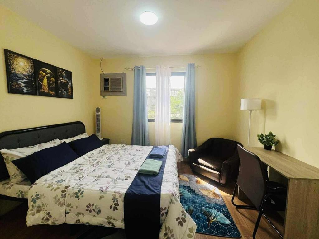 Ένα ή περισσότερα κρεβάτια σε δωμάτιο στο Secure & Serene 2 Bedrooms Townhouse with Parking