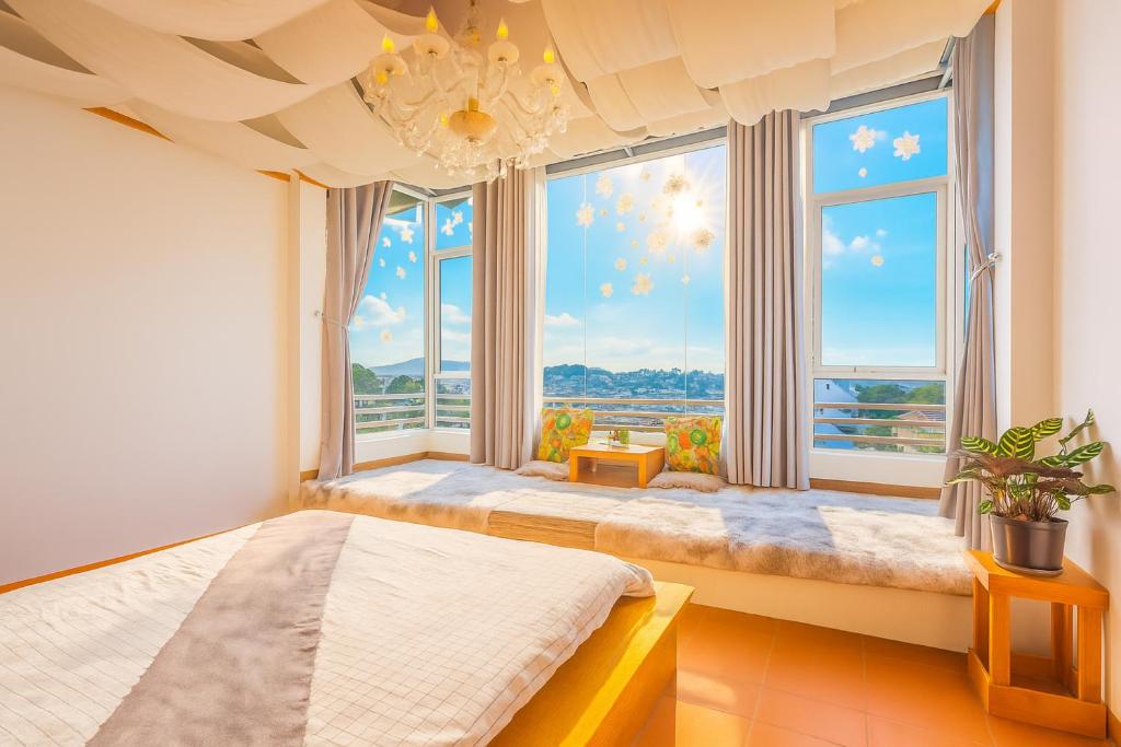 Postel nebo postele na pokoji v ubytování Phố Thường Garden