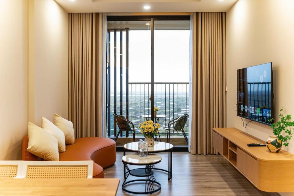 TV a/nebo společenská místnost v ubytování EcoLuxe Home