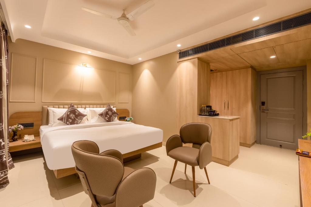 Ένα ή περισσότερα κρεβάτια σε δωμάτιο στο Vibe House - A Boutique Stay