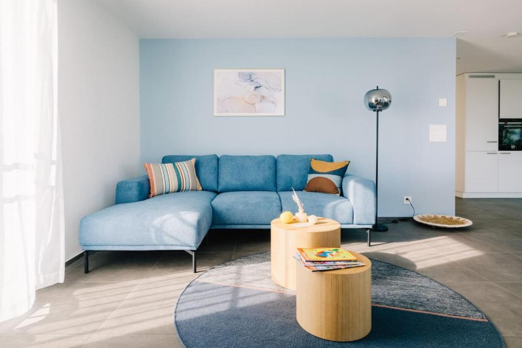 Χώρος καθιστικού στο Jungfrau Lake Apartment