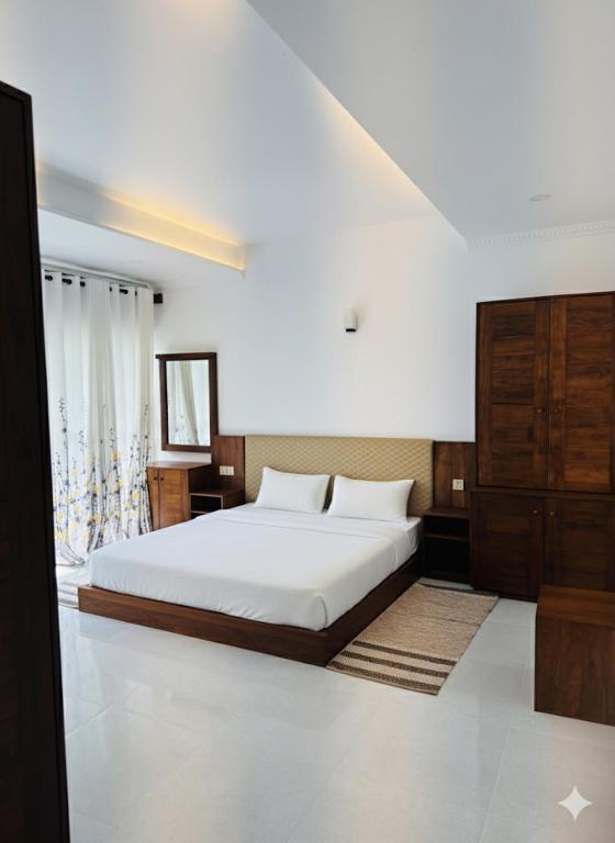 Postel nebo postele na pokoji v ubytování Threesaru resort