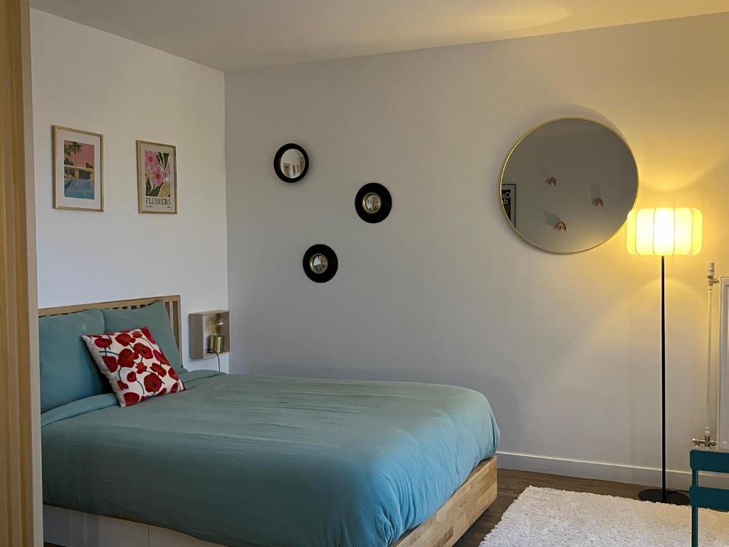 Ένα ή περισσότερα κρεβάτια σε δωμάτιο στο Chez Max