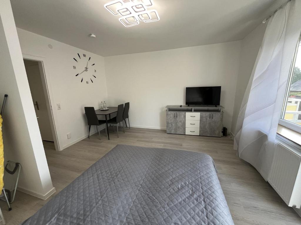 TV a/nebo společenská místnost v ubytování Etw-Sarstedt