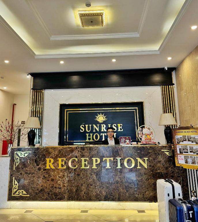 a sun rise hot reception in a hotel lobby at Sunrise Hanoi Hotel in Hanoi