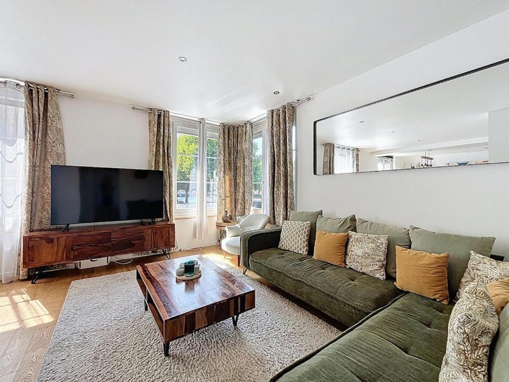 Et tv og/eller underholdning på Appartement Caen Rives de lOrne