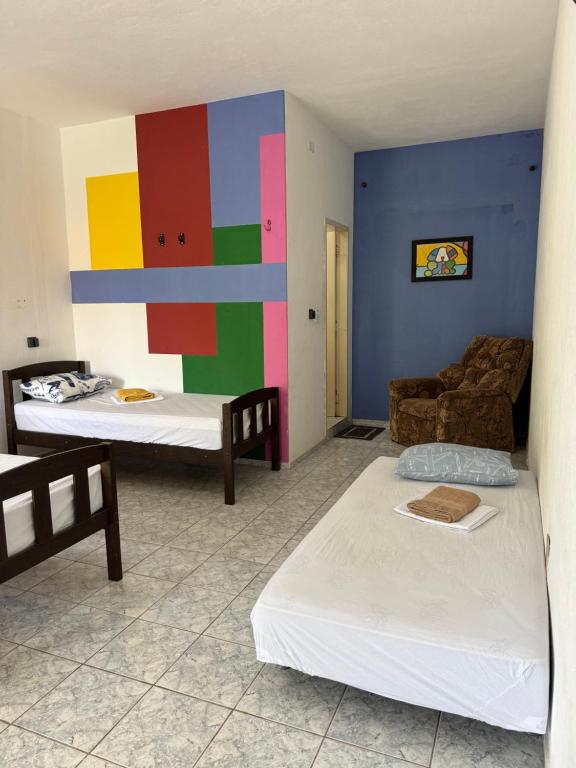 Ένα ή περισσότερα κρεβάτια σε δωμάτιο στο CASA DE LA ABUELA