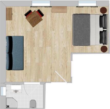 a floor plan of a room with a table at Gästehaus Jekle in Neuburg an der Kammel