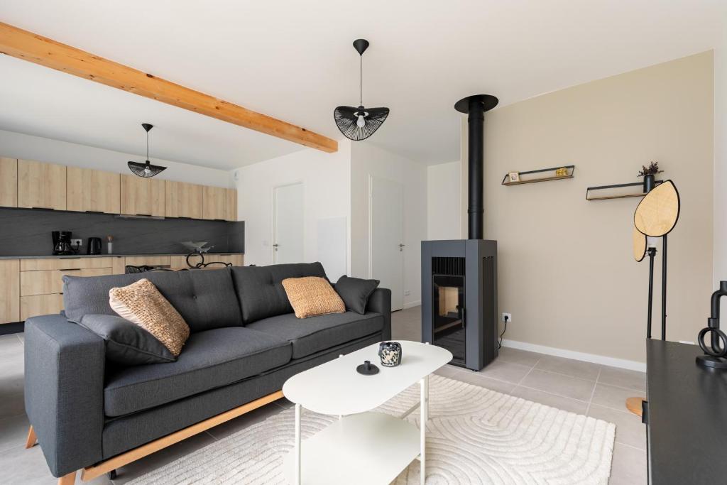 Χώρος καθιστικού στο Jolie maison lumineuse de style industriel