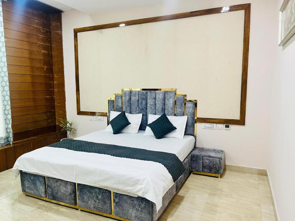 Postel nebo postele na pokoji v ubytování Hotel Agm