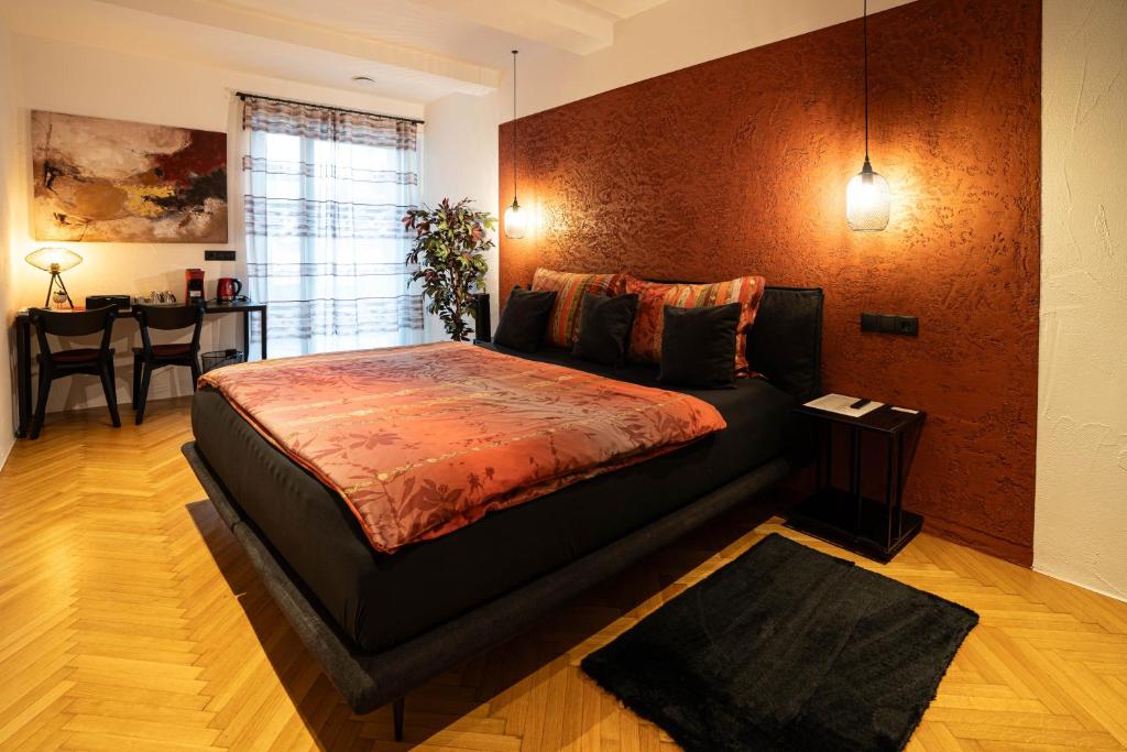 Un pat sau paturi într-o cameră la Laubennest 2