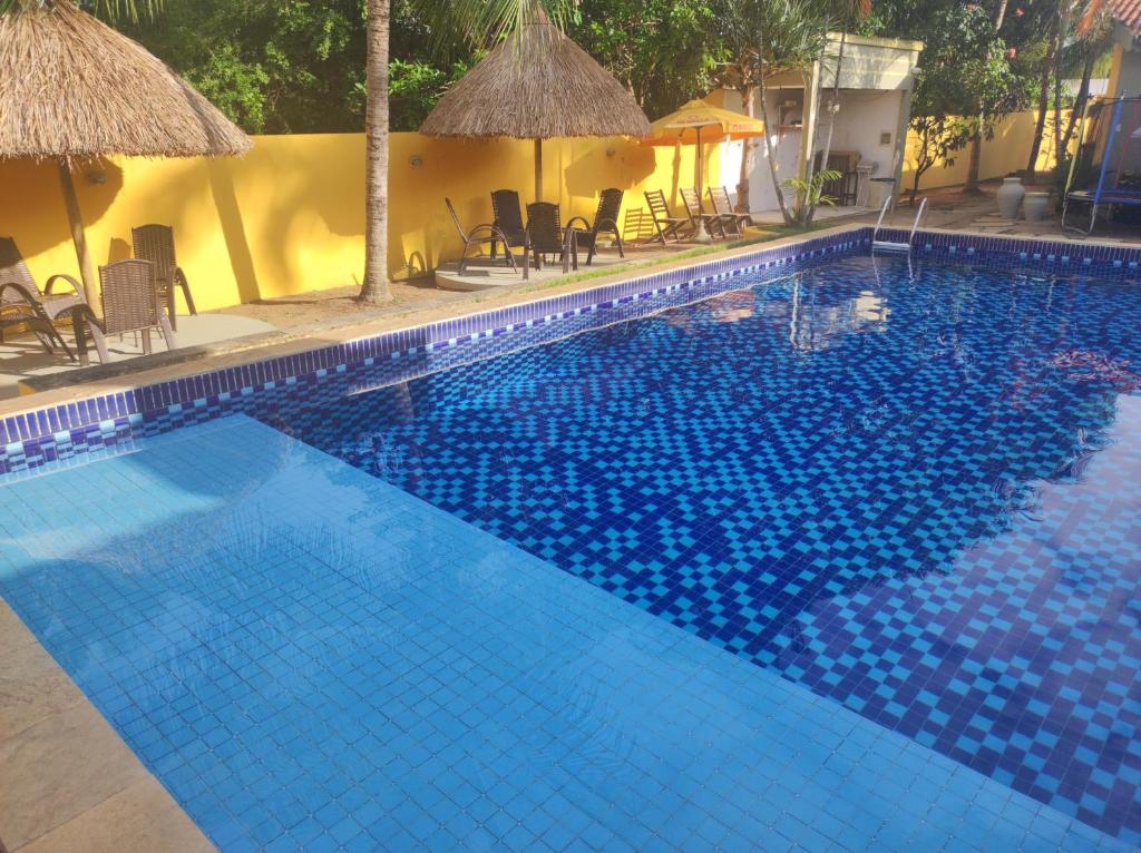 Bazén v ubytování Nova Costeira da Barra nebo v jeho okolí