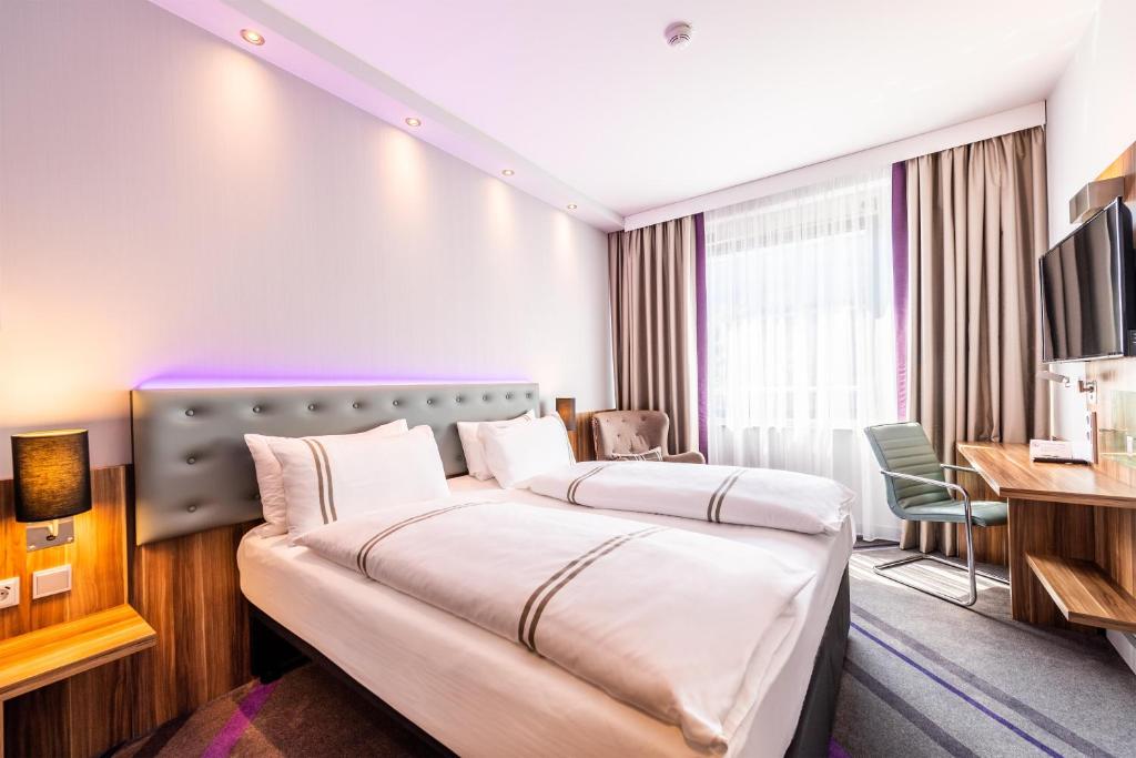 Postel nebo postele na pokoji v ubytování Premier Inn Essen City Limbecker Platz