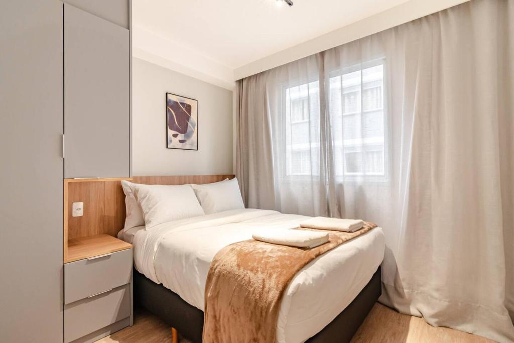 BHomy Mapp tesisinde bir odada yatak veya yataklar