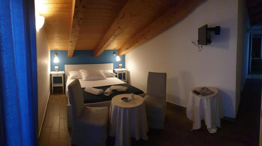 Postel nebo postele na pokoji v ubytování B&B Stella del Cilento Rooms "Vista sul Golfo "