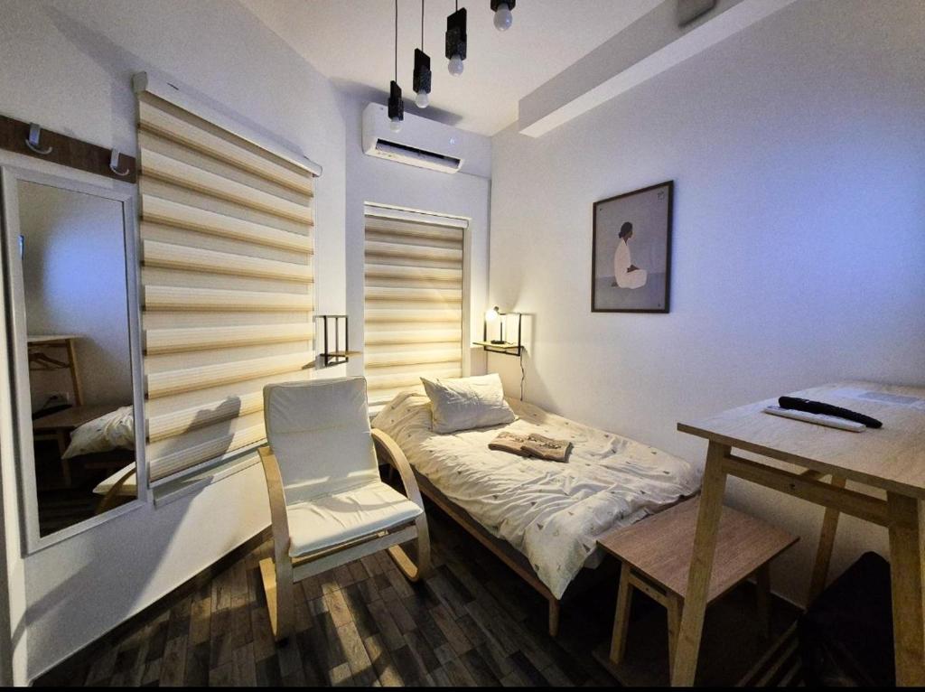 Ένα ή περισσότερα κρεβάτια σε δωμάτιο στο Mirka's dream