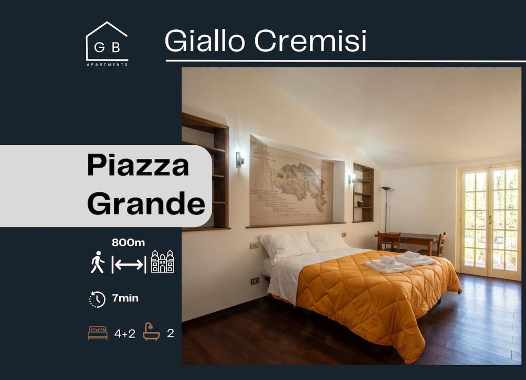 a bedroom with a bed in a room at Piazza Grande-Giallo Cremisi in Arezzo