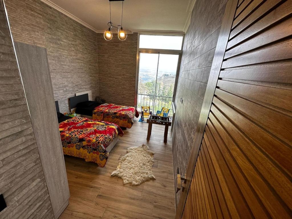 Ένα ή περισσότερα κρεβάτια σε δωμάτιο στο Khalil's Heaven Villa