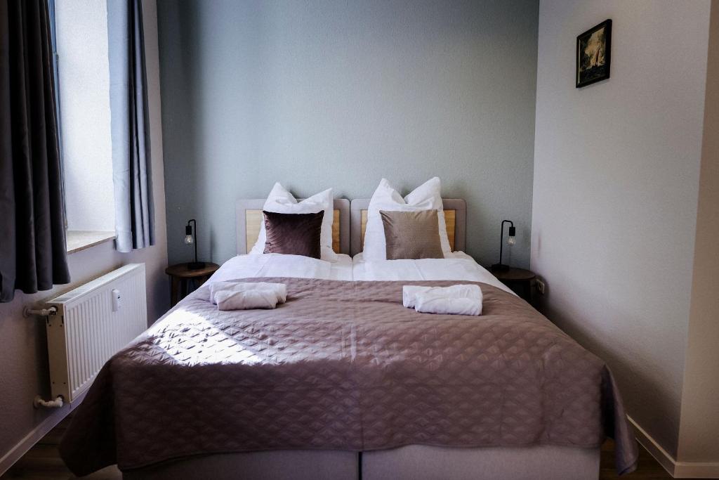 Postel nebo postele na pokoji v ubytování Neu renoviert I zentrale EG-Wohnung I 4 Personen, salt apartments