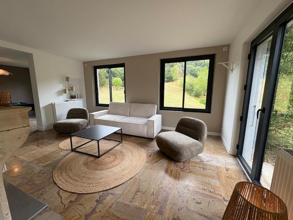 Posezení v ubytování Les Vignes Rouges