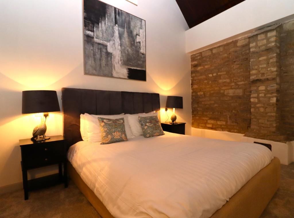 Postel nebo postele na pokoji v ubytování Mayfield Cottage