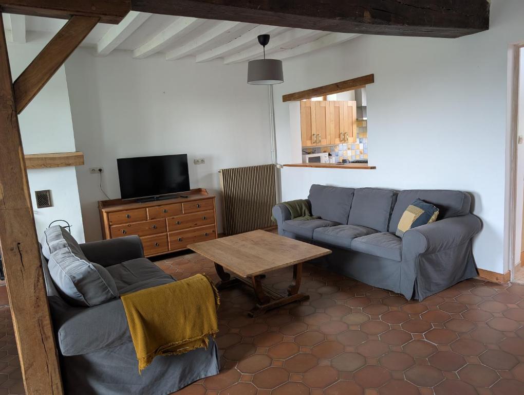 Posezení v ubytování Les Hiboux