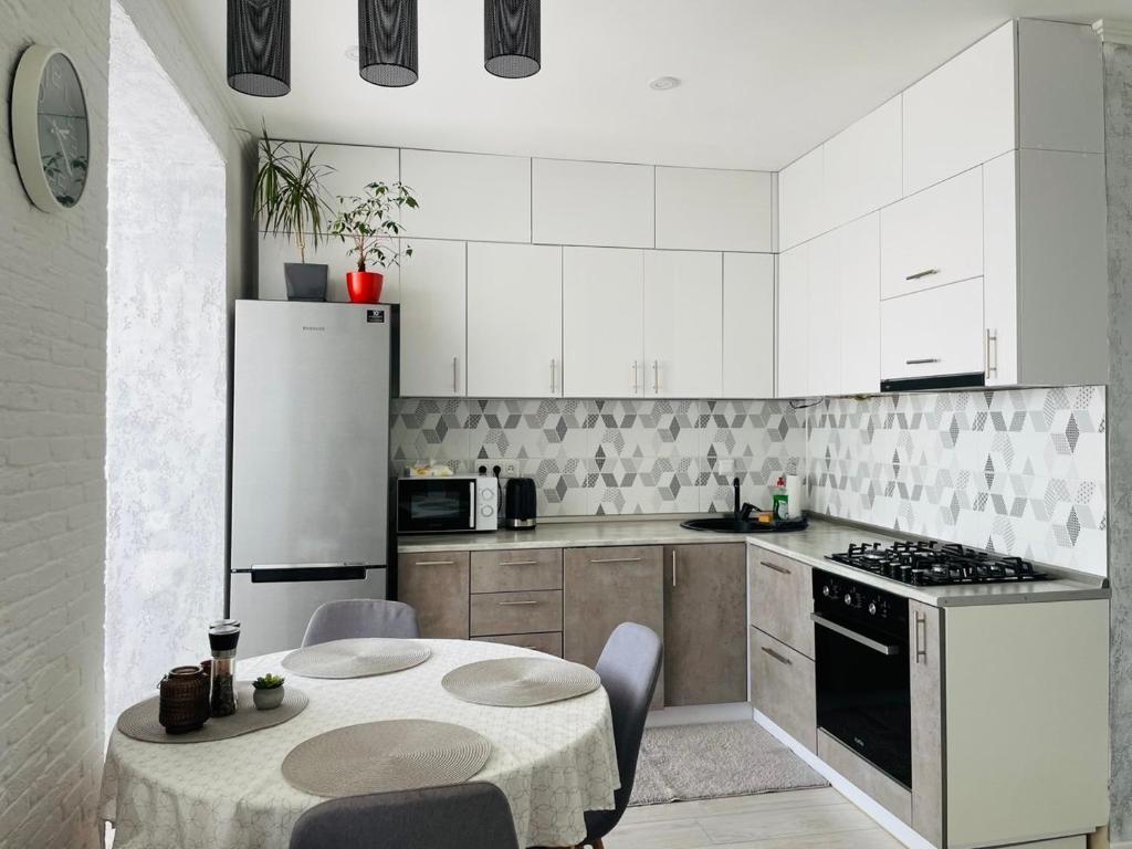 Køkken eller tekøkken på Riviera Apartments