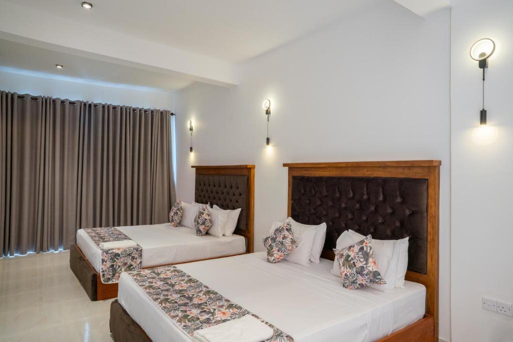 Ένα ή περισσότερα κρεβάτια σε δωμάτιο στο Crystal Springs Homestay