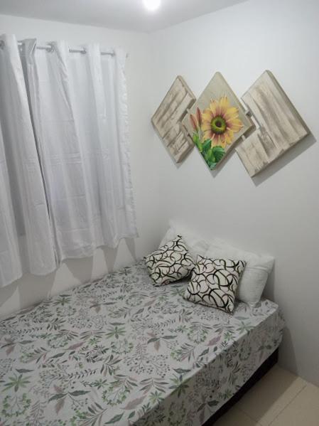 Postel nebo postele na pokoji v ubytování Kit net para curta temporada