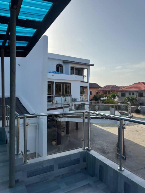 a view of a building from a balcony at JD Hotel in Accra