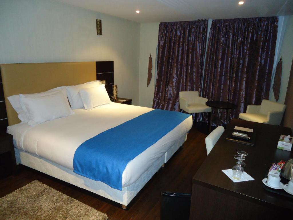 Postel nebo postele na pokoji v ubytování Hotel Emilio Moretti